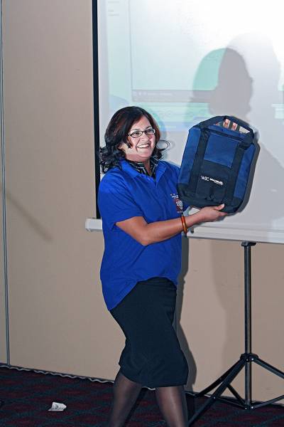 Rohini Morley, modelling WWW7 shirt and W3C accessories,  | DSTC Farewell Symposium, 28 July 2005  | 