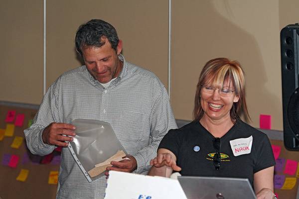 Naomi Andrew, hosting the DSTC raffes,  | DSTC Farewell Symposium, 28 July 2005  | 