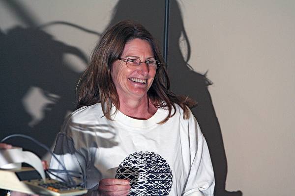 Liz Armstrong calling the name of the lucky Golden Calculator winner,  | DSTC Farewell Symposium, 28 July 2005  | 