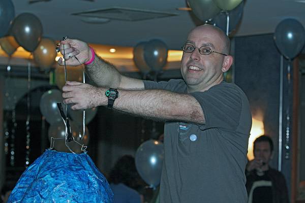 Tim Mansfield, human hook for the DSTC Lolly Fish Pinata,  | DSTC Farewell Symposium, 28 July 2005  | 