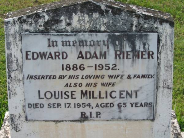 Edward Adam RIEMER,  | 1886 - 1952,  | inserted by wife & family;  | Louise Millicent,  | wife,  | died 17 Sept 1954 aged 65 years;  | Appletree Creek cemetery, Isis Shire  | 