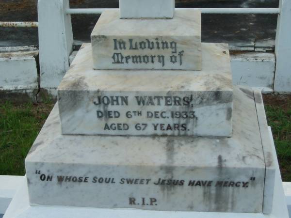 John WATERS,  | died 6 Dec 1933 aged 67 years;  | Margaret WATERS, mother,  | died 14 Nov 1955 aged 79 years;  | Thomas D. WATERS,  | died 10 Oct 1980 aged 68 years;  | Marie WATERS,  | died 23 Oct 1990 aged 79 years;  | Sacred Heart Catholic Church, Christmas Creek, Beaudesert Shire  | 