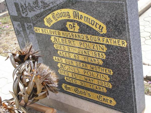 Albert POLZIN, husband father,  | died 9 June 1985 aged 82 years;  | Agnes POLZIN, mother,  | died 25 May 2000 aged 93 years;  | Douglas Lutheran cemetery, Crows Nest Shire  | 