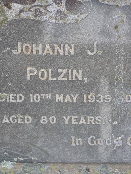 Johann J. POLZIN,  | died 10 May 1939 aged 80 years;  | Bertha M. POLZIN,  | died 10 Jan 1933 aged 74 years;  | Douglas Lutheran cemetery, Crows Nest Shire  | 