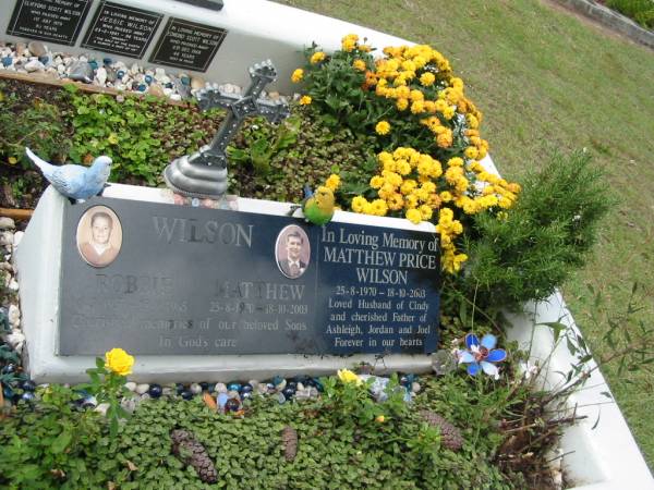 Wilson and families memorial  |   | Robbie WILSON  | b: 6-9-1957  | d: 15-9-1965  |   | Matthew Price WILSON  | b: 25-8-1970  | d: 18-10-2003  | (husband of Cindy, father of Ashleigh, Jordan, Joel)  |   | St Matthew's (Anglican) Grovely, Brisbane  | 