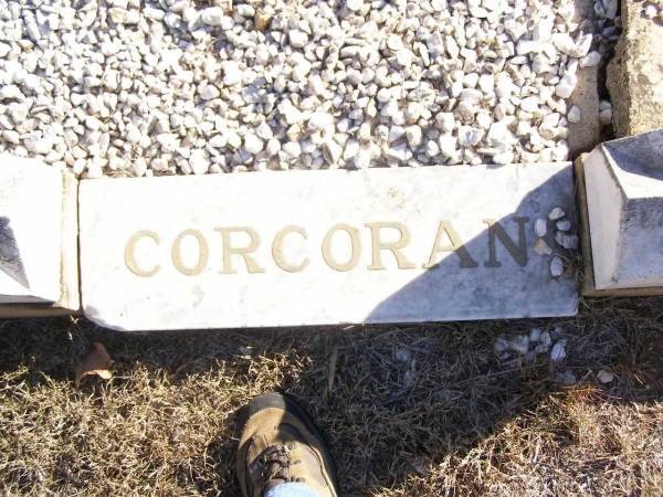 John CORCORAN,  | born Drumbarie Co Tipperary Ireland 1 Jan 1856,  | died 29 May 1925 aged 69 years;  | Margaret Anne CORCORAN, wife,  | died 8 Nov 1949 aged 93 years;  | Delia, daughter,  | died 13 Dec 1948 aged 61 years;  | Michael, son.  | died 20 Feb 1898 aged 15 months;  | Helidon Catholic cemetery, Gatton Shire  | 