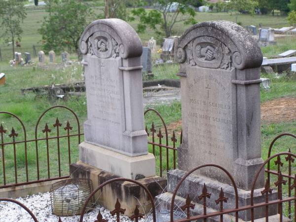 Joseph SCANLAN,  | husband of Jane Mary SCANLAN,  | born Co Longford Ireland 10 April 1851,  | died 17 May 1922 in 71st year;  | Jane Mary SCANLAN,  | born Co Limerick Ireland 5 March 1853,  | died 19 July 1931 in 79th year;  | Helidon General cemetery, Gatton Shire  | 