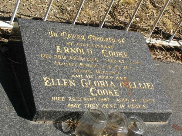 Arnold COOKE,  | husband,  | died 28 April 1980 aged 67 years,  | remembered by wife Nell;  | Ellen Gloria (Nellie) COOKE,  | wife,  | died 26 Sept 1987 aged 61 years;  | Jondaryan cemetery, Jondaryan Shire  | 