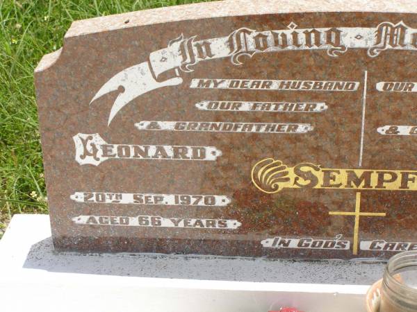 Leonard SEMPF,  | husband father grandfather,  | died 20 Sept 1970 aged 66 years;  | Lilly Annie SEMPF,  | mother grandmother great-grandmother,  | died 15 Nov 1992 aged 84 years;  | Kilkivan cemetery, Kilkivan Shire  | 