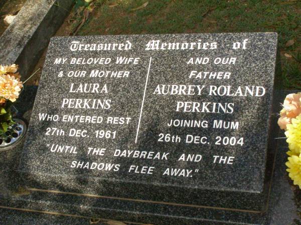 Laura PERKINS,  | wife mother,  | died 27 Dec 1961;  | Aubrey Roland PERKINS,  | father,  | died 26 Dec 2004;  | Lawnton cemetery, Pine Rivers Shire  | 