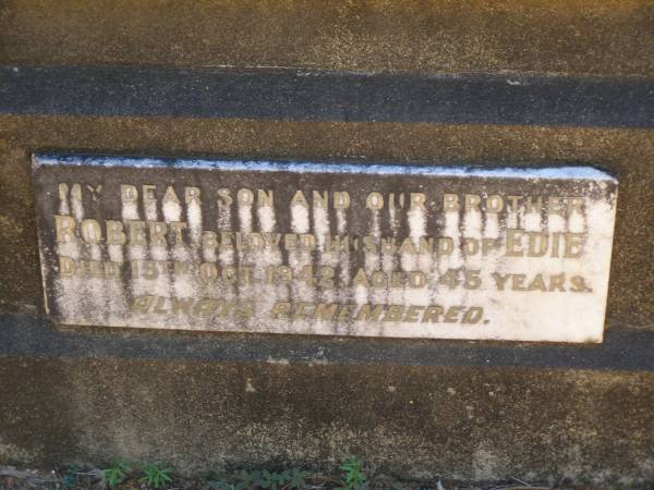 Charles PATTERSON,  | husband father,  | died 23 June 1928 aged 74 years;  | Minnie PATTERSON,  | mother,  | died 8 Oct 1947;  | Robert,  | husband of Edie,  | son brother,  | died 15 oct 1942 aged 45 years;  | Lawnton cemetery, Pine Rivers Shire  | 