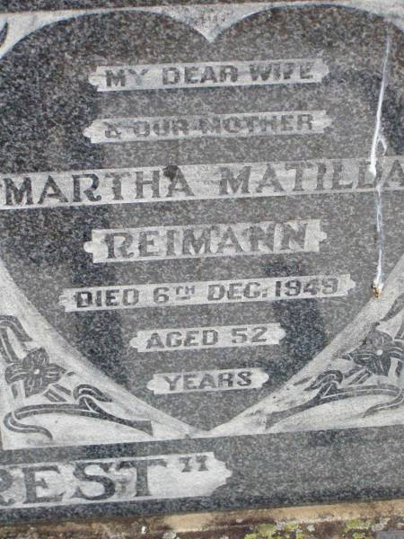 Frederick William REIMANN, father,  | died 18 May 1969 aged 70 years;  | Martha Matilda REIMANN, wife mother,  | died 6 Dec 1949 aged 52 years;  | Ma Ma Creek Anglican Cemetery, Gatton shire  | 