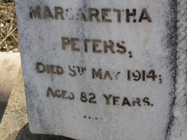 Margaretha PETERS,  | died 5 May 1914 age 82 yearss;  | Hans,  | husband,  | died 19 Jan 1912 aged 77 years;  | Walter & Oscar,  | children of W.J. & W. PETERS;  | Meringandan cemetery, Rosalie Shire  | 