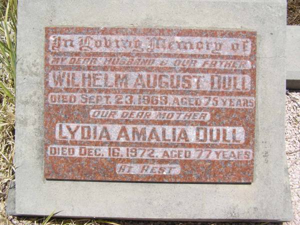 Wilhelm August DULL,  | husband father,  | died 23 Sept 1969 aged 75 years;  | Lydia Amalia DULL,  | mother,  | died 16 Dec 1972 aged 77 years;  | Milbong St Luke's Lutheran cemetery, Boonah Shire  | 
