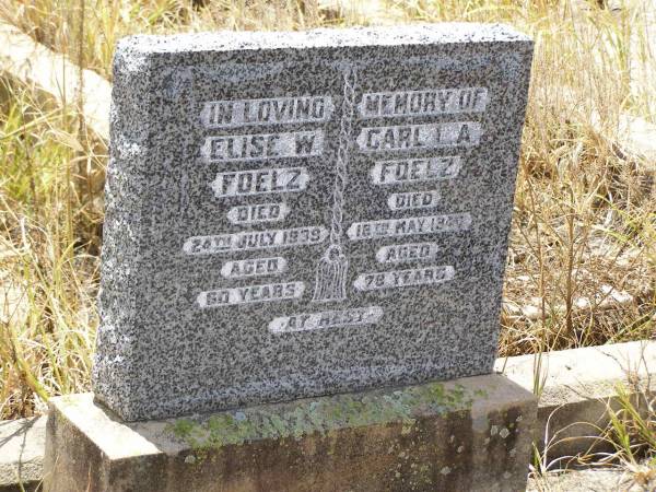 Elise W. FOELZ,  | died 24 July 1939 aged 60 years;  | Carl L.A. FOELZ,  | died 16 May 1940 aged 79? years;  | Milbong St Luke's Lutheran cemetery, Boonah Shire  | 