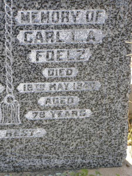 Elise W. FOELZ,  | died 24 July 1939 aged 60 years;  | Carl L.A. FOELZ,  | died 16 May 1940 aged 79? years;  | Milbong St Luke's Lutheran cemetery, Boonah Shire  | 