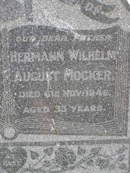 Minnie MOCKER,  | mother,  | died 13? Feb 1945 aged 69 years;  | Hermann Wilhelm August MOCKER,  | father,  | died 6 Nov 1946 aged 83? years;  | Milbong St Luke's Lutheran cemetery, Boonah Shire  | 