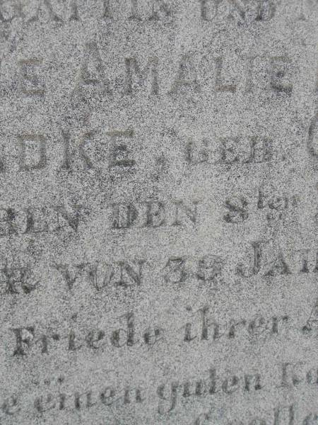 Emelie Amalie Mathilde BADKE, nee GUNTHER,  | wife mother,  | died 8 Feb 1888 aged 39 years 4 months;  | August Ferdinand BADKE,  | husband father,  | died 27 Jan 1928 aged 81 years;  | Milbong St Luke's Lutheran cemetery, Boonah Shire  | 