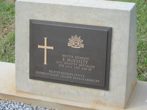 E. MCQUILTY,  | died 5 July 1957 aged 39 years,  | husband of Rita,  | father of Barry, Colleen, Donald & Marilyn;  | Murwillumbah Catholic Cemetery, New South Wales  | 