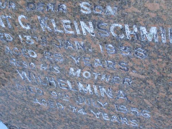 Vincent C. KLEINSCHMIDT,  | son,  | died 13 Jan 1938 aged 25 years;  | Wilhelmina,  | mother,  | died 9 July 1956 aged 74 years;  | Pimpama Island cemetery, Gold Coast  | 