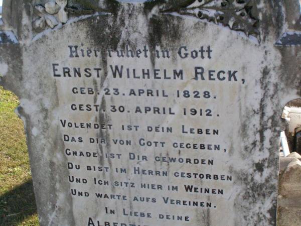 Ernst Wilhelm RECK,  | born 23 April 1928 died 30 April 1912,  | dear? Albertiene RECK;  | Tarampa Apostolic cemetery, Esk Shire  | 