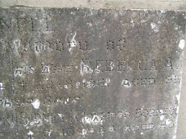 Samuel BIGNELL,  | died 29-3-1949 aged 81 years;  | Rebecca A. BIGNELL,  | wife,  | died 22-8-1961 aged 91 years;  | Walter,  | son,  | died Tobruk 9-6-41 aged 29 years;  | Sidney K.,  | son,  | died Borneo 3-10-1943 aged 23 years;  | Samuel J.,  | son,  | died 29-8-62 aged 57 years;  | Upper Coomera cemetery, City of Gold Coast  | 