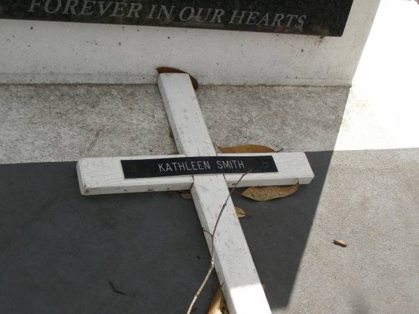 Kathleen Evelyn SMITH,  | wife of Russell SMITH,  | died 7-7-2004 aged 79 years;  | Upper Coomera cemetery, City of Gold Coast  | 
