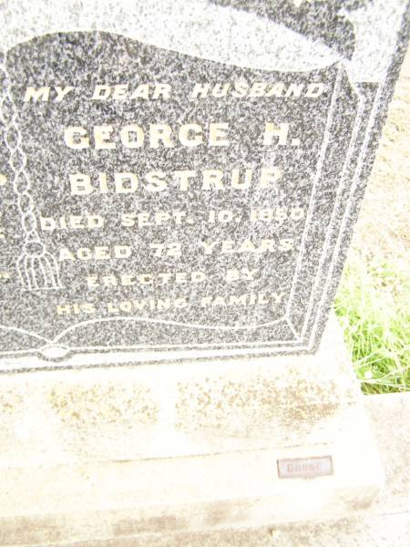 Jane BIDSTRUP,  | mother,  | died 28 May 1952 aged 70 years;  | George H. BIDSTRUP,  | husband,  | died 10 Sept 1950 aged 72 years;  | Warra cemetery, Wambo Shire  | 