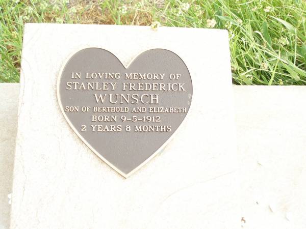 Stanley Frederick WUNSCH,  | son of Berthold & Elizabeth,  | born 9-5-1912,  | died aged 2 years 8 months;  | Warra cemetery, Wambo Shire  | 